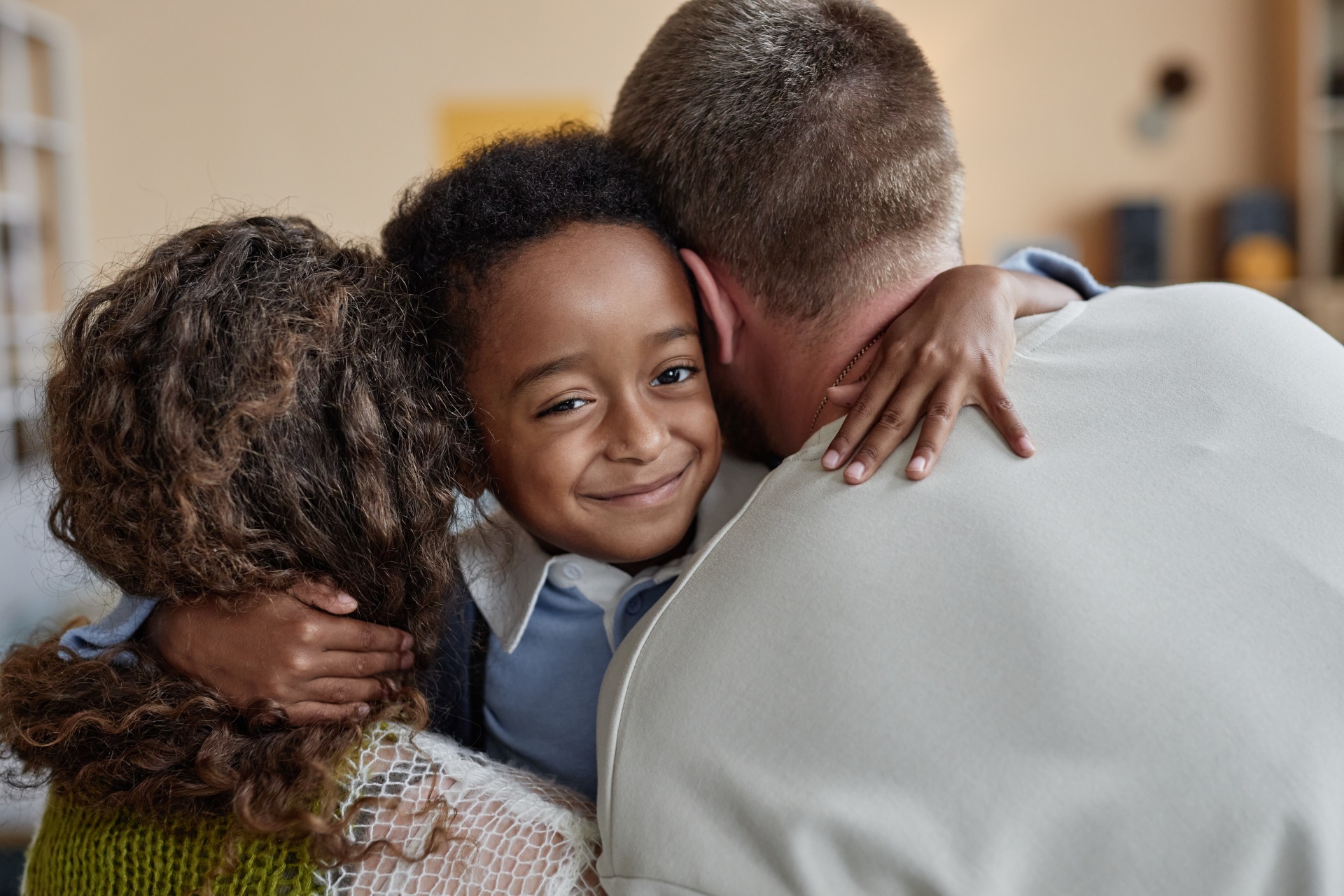 Supporting parents with happy boy