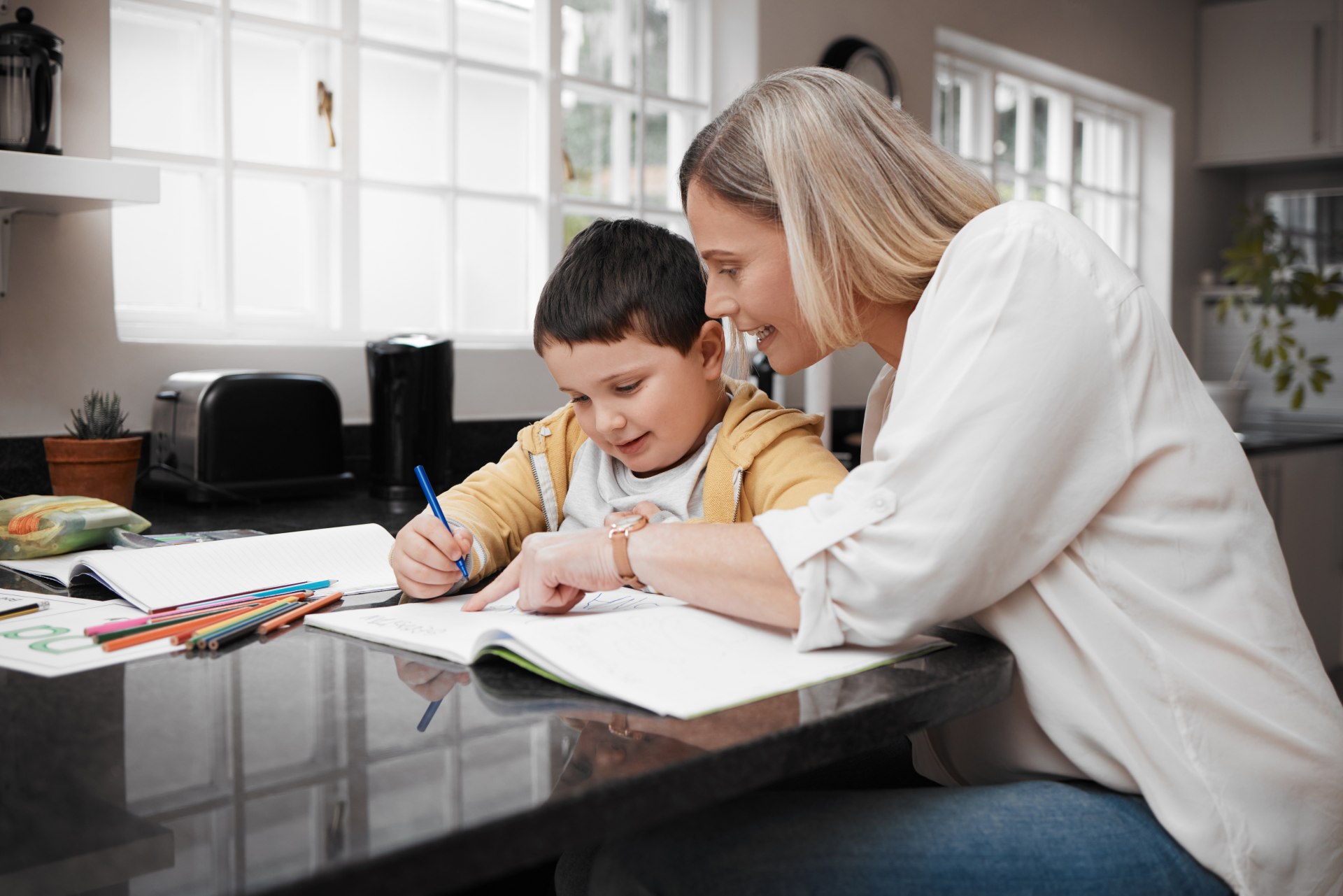 mother-helping-her-son-study