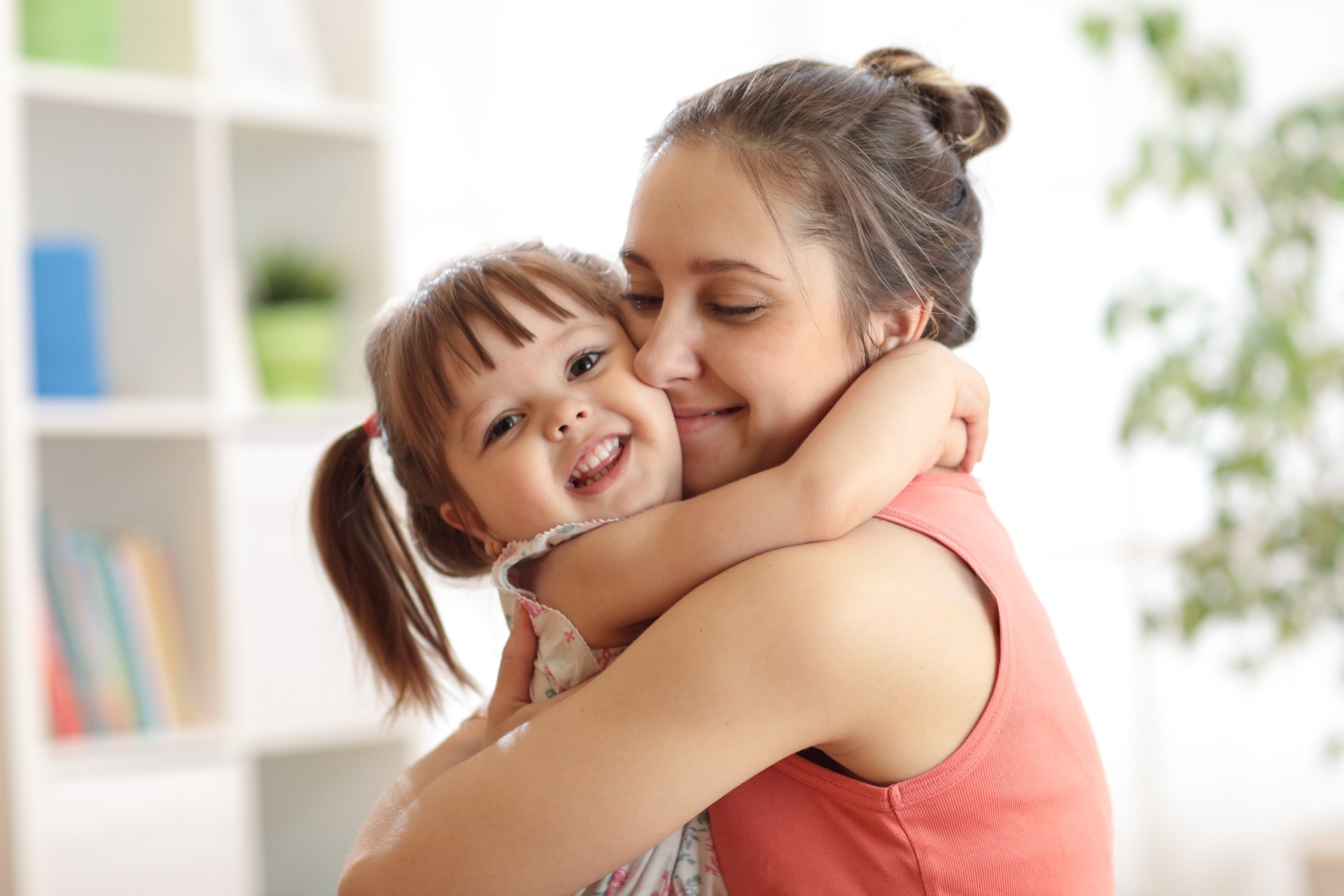 parenting-hugging-child-smiling