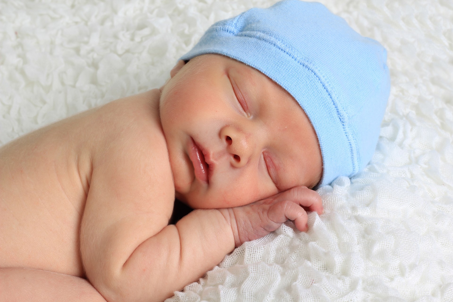 Sleeping Baby with Blue Hat