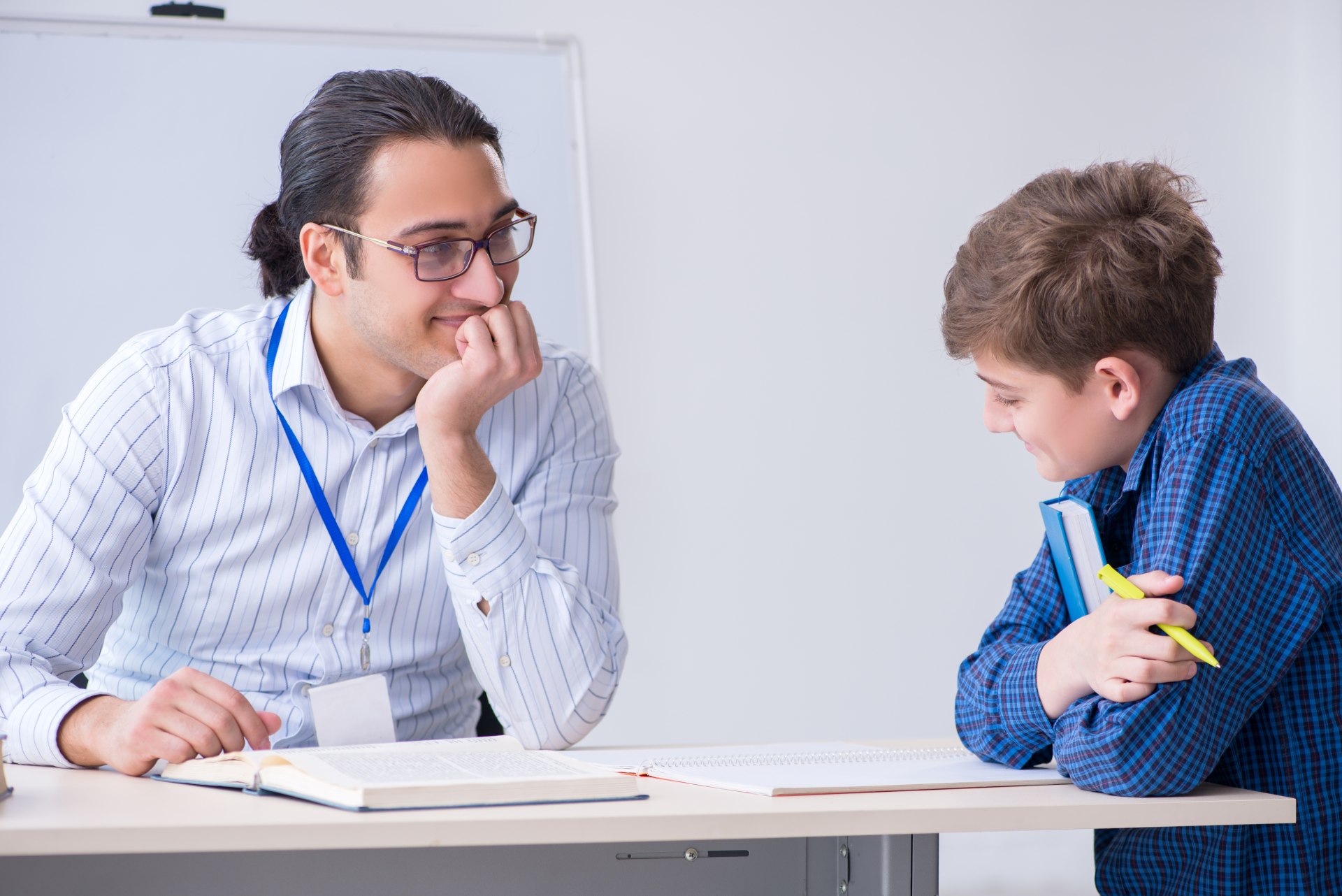 Teacher tutoring student