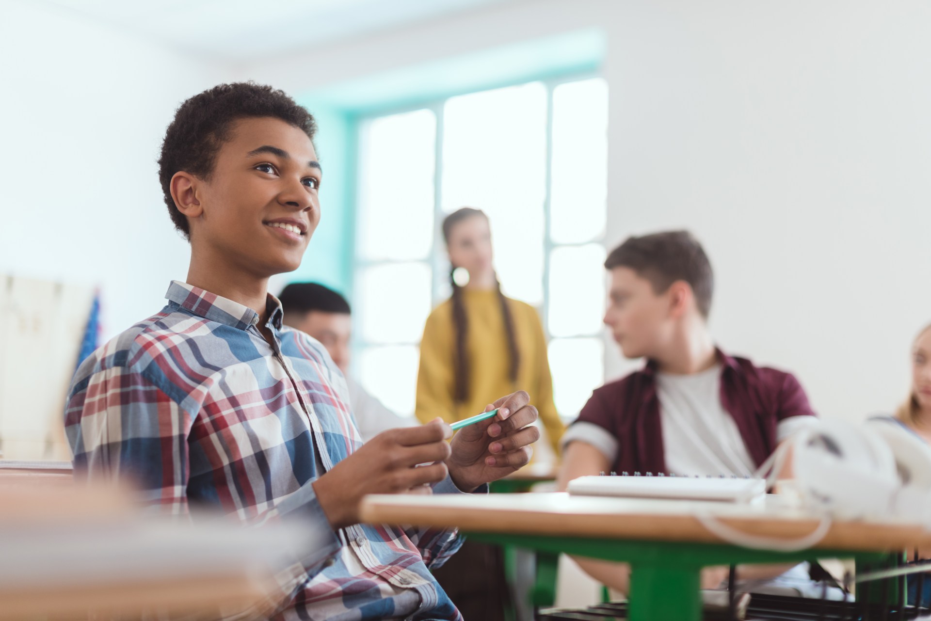 teenage-boy-in-classroom-at-school