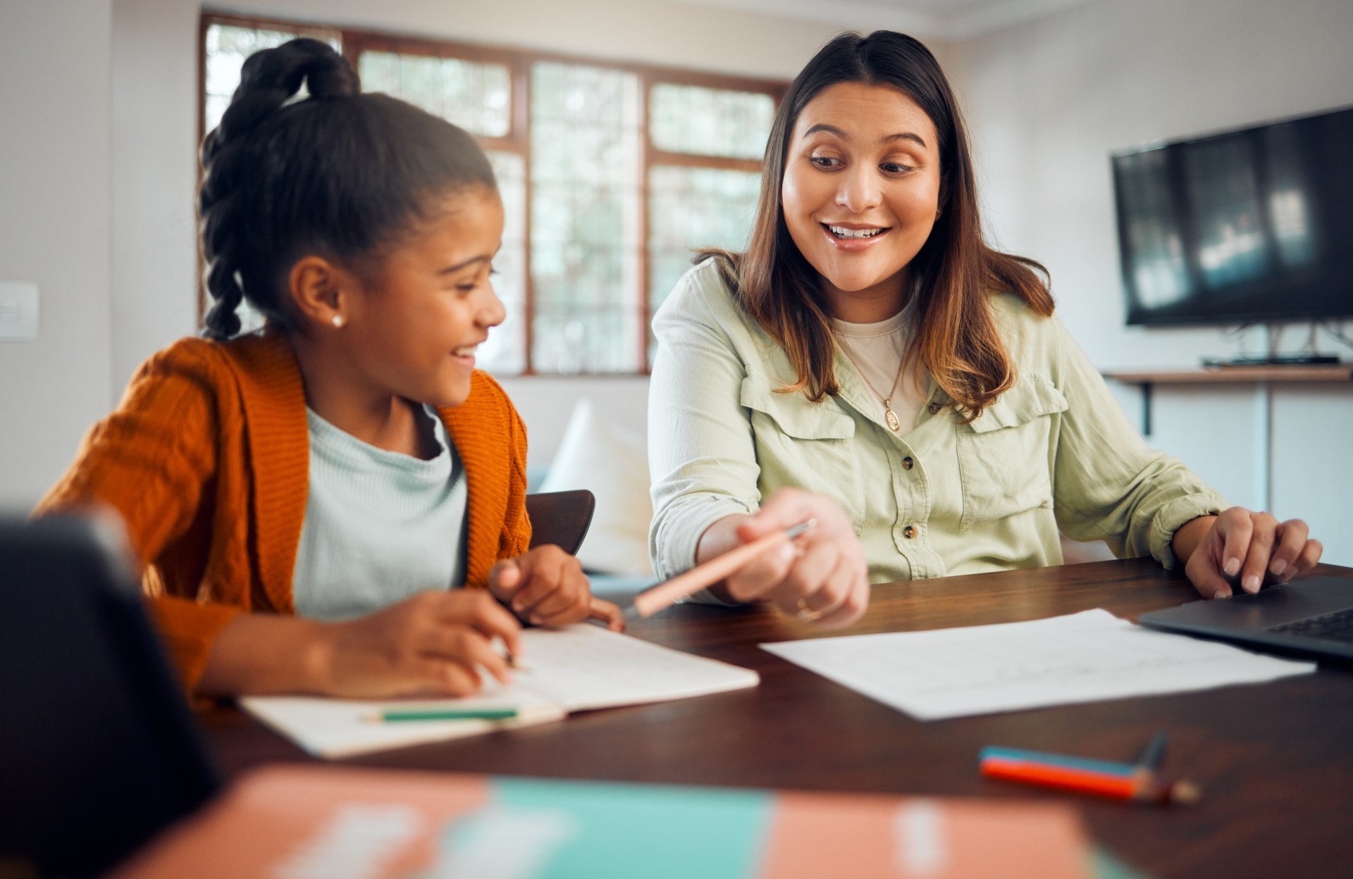 Woman tutoring girl student
