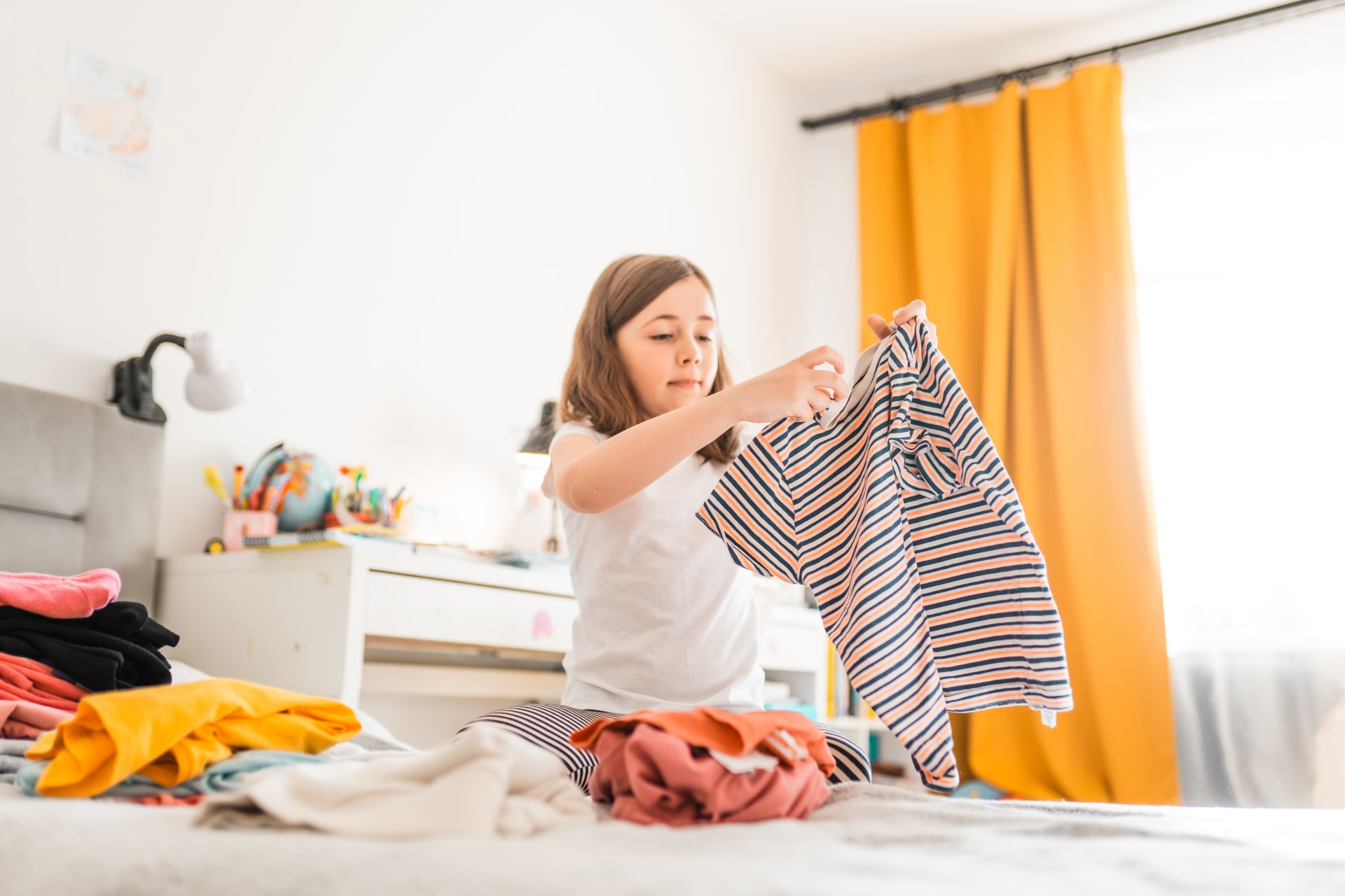 Young child doing chores