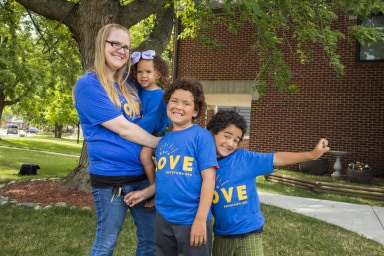 Family in Teach Live t-shirts at Boys Town