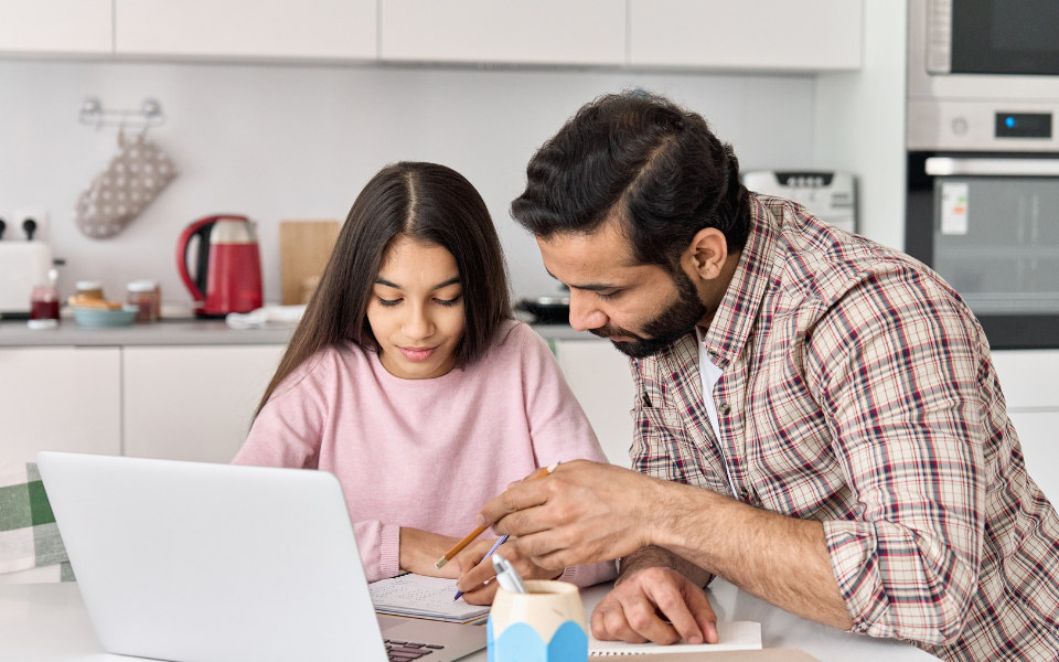 parent-helping-child-with-homework-and-AI
