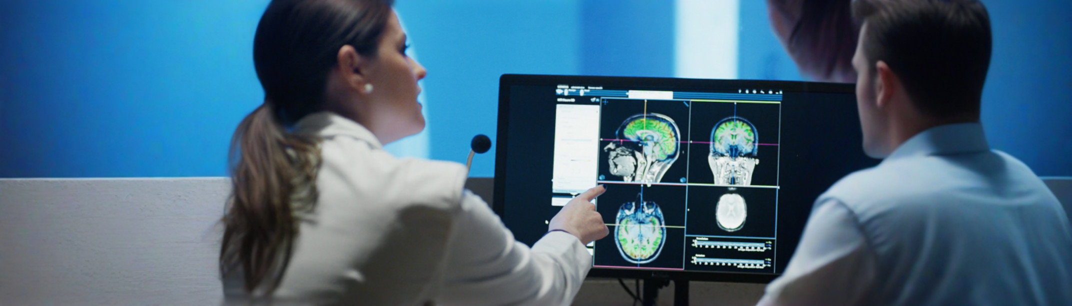 Research or hospital staff viewing imaging results