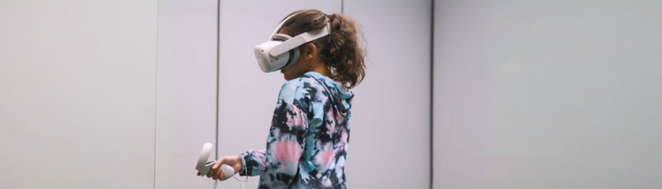 Girl with VR goggle in research camp