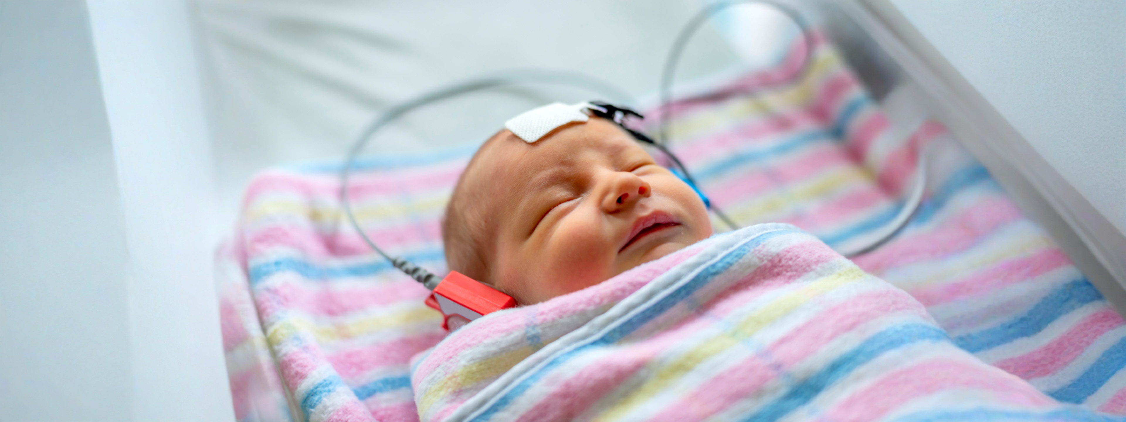 Baby with hearing test device