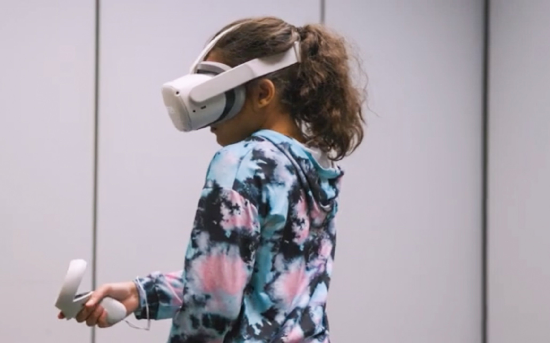 Girl with VR goggle in research camp