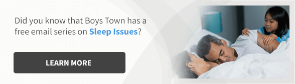 kid waking parents in bed